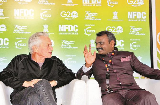 Union Minister L Murugan can be seen with Hollywood actor Michael Douglas